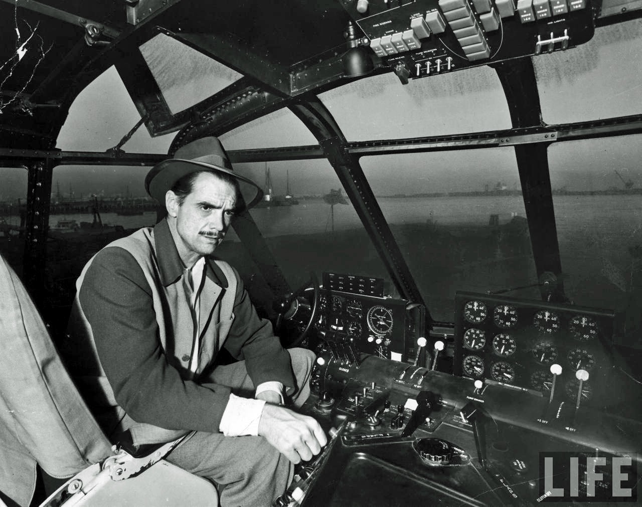 Howard Hughes inside of the H-4 Hercules , more widely known as the 