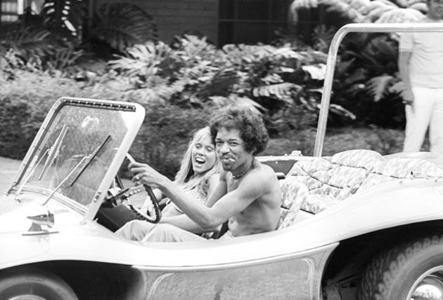 Jimi Hendrix driving a dune buggy