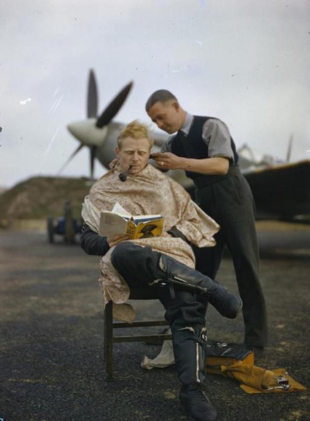 RAF pilot getting a haircut between missions